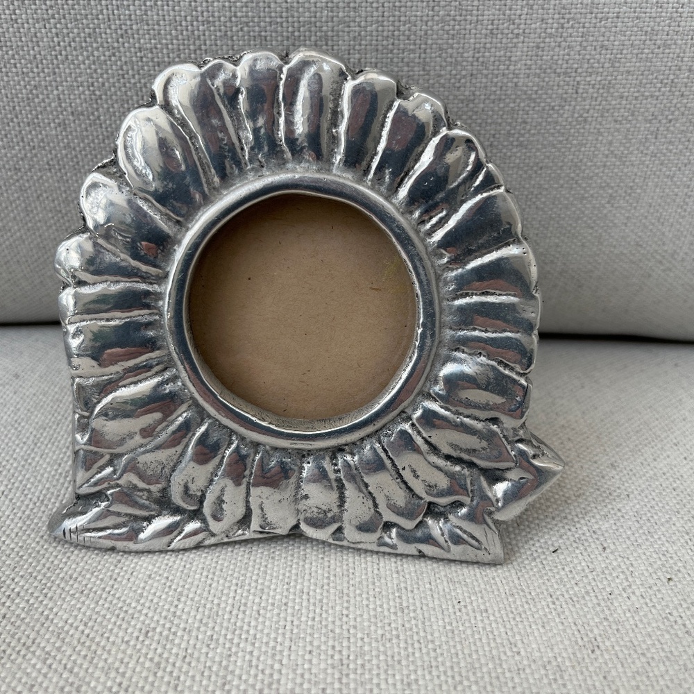 Lovely Mexican silver sunflower frame. Holds 2.3-2.5” photo, excellent condition